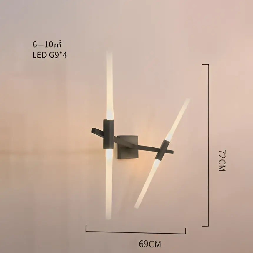 Modern black metal wall sconce with two angled led light bars complementing decorbites branch suspension pendant light