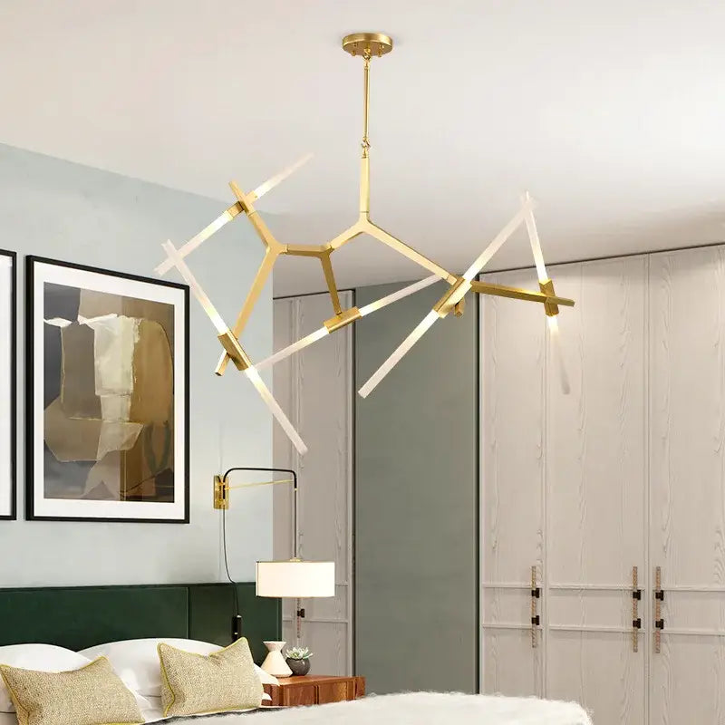 Modern gold and black branch suspension pendant light with gold-toned geometric rods and white light tubes for dining room decorbites branch suspension pendant