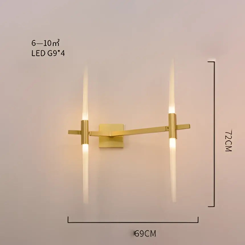 Modern gold and black branch suspension pendant light with gold-toned wall sconce and two vertical led fixtures