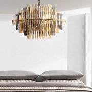 A modern gold and black brass glass ceiling chandelier with concentric metallic rods ideal for living room decorbites brass glass decor