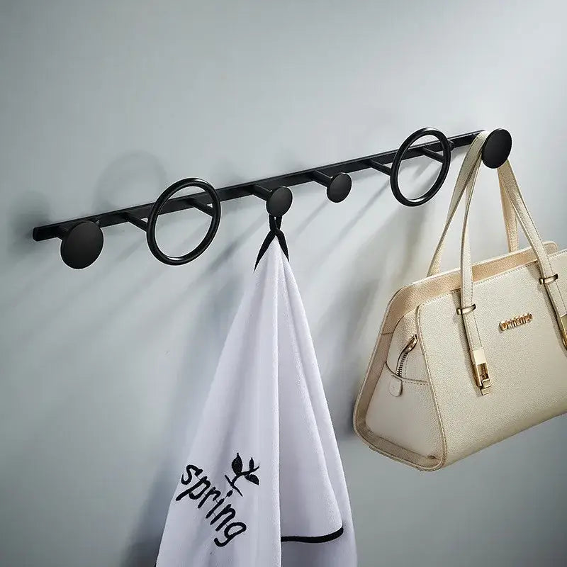 Black metal wall-mounted towel hook set with circular hooks modern gold and black brass bathroom hanger