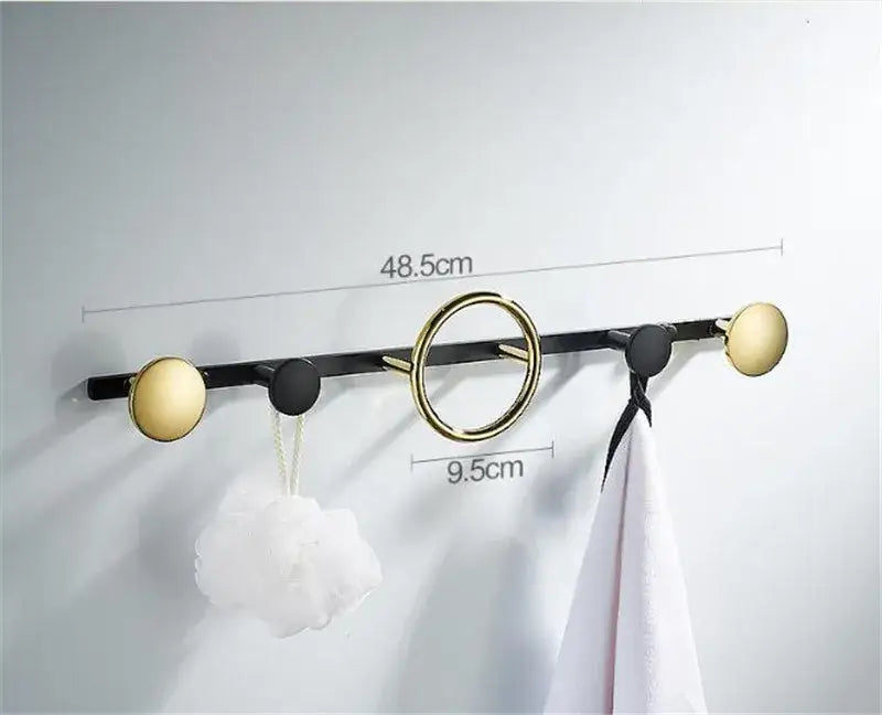 Modern gold and black brass towel hook set with circular hooks wall mounted for bathroom use