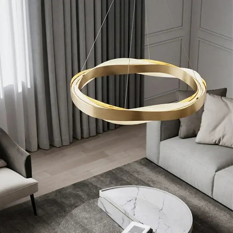 Modern gold and black circle pendant light featuring a sleek intertwined ring design for elegant living room lighting