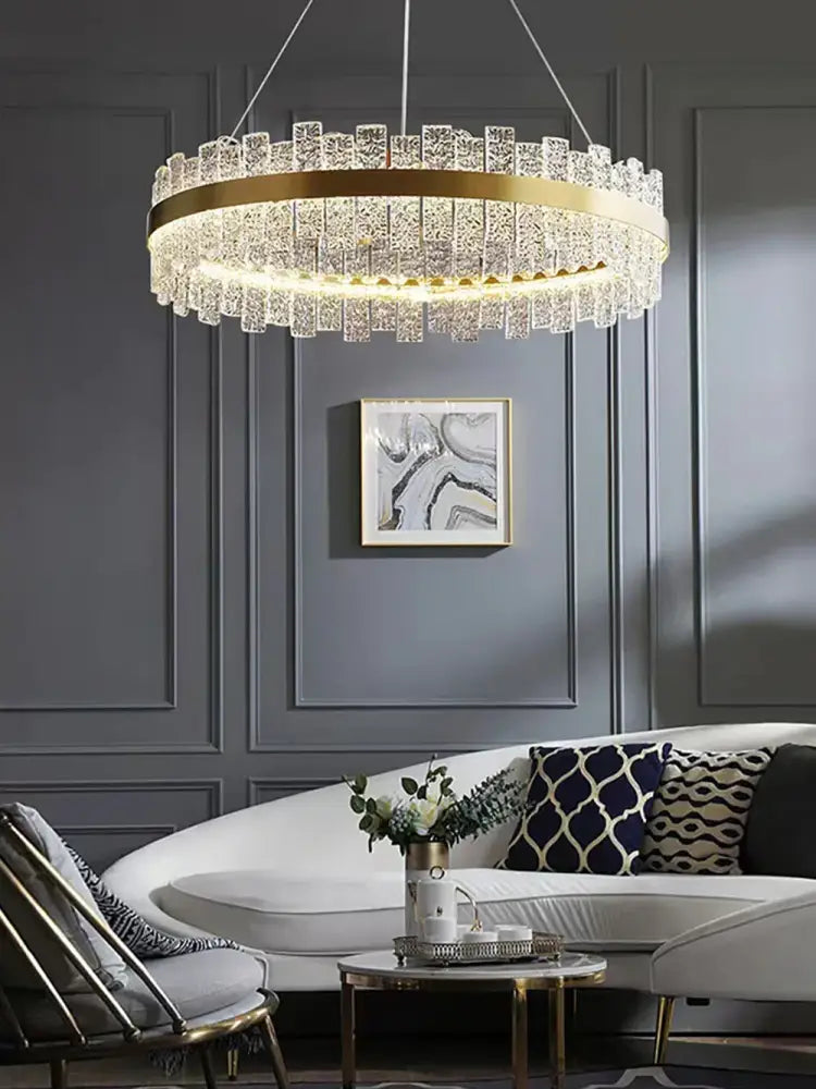 Modern gold and black crystal led chandelier dining room pendant light with gold frame and cascading clear prisms decorbites crystal led