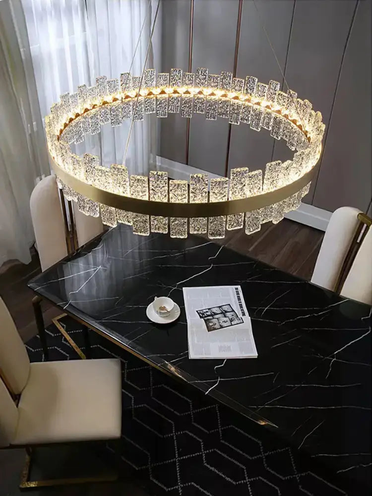 Modern gold and black crystal led chandelier dining room pendant light with gold-toned circular frame and cascading crystal blocks decorbites crystal led