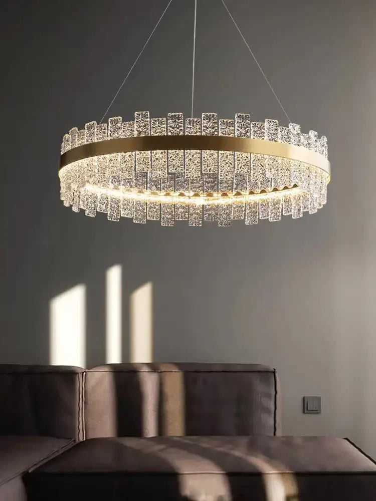 Modern gold and black decorbites crystal led chandelier with cascading clear prisms for dining room pendant light