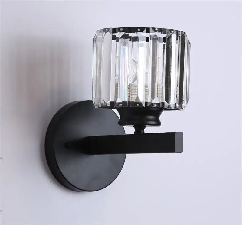 Black wall sconce with cylindrical crystal shade in gold and black by decorbites crystal sconce light for bedroom decor