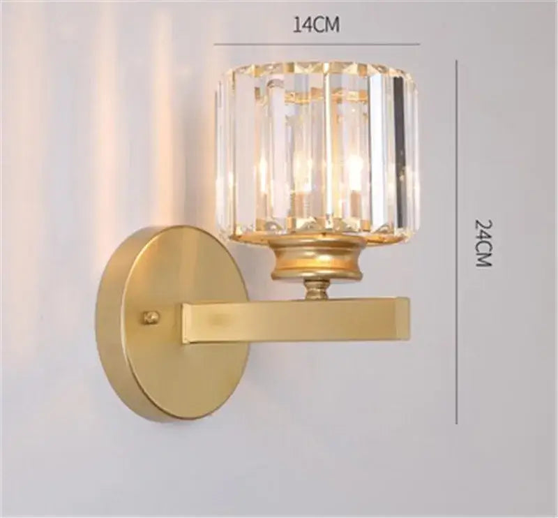 Modern gold and black crystal sconce light with a gold-toned wall fixture and faceted crystal glass shade decorbites crystal sconce