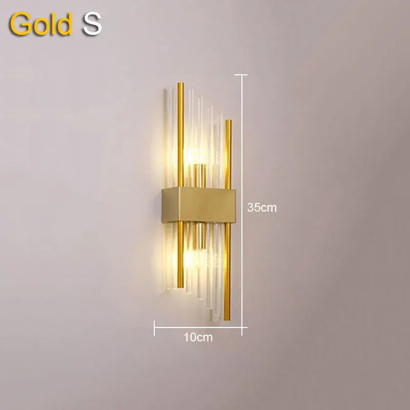 Modern gold and black crystal wall lamp featuring vertical glass rods and metallic accents for living room decorbites crystal wall
