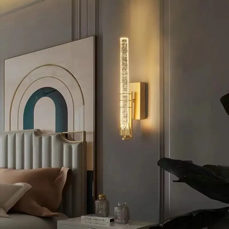 Modern gold and black crystal wall sconce with a gold-toned textured glass panel emitting warm led light for bedroom decorbites crystal wall sconce