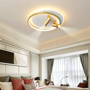 Modern gold and black decorbites dimmable led ceiling lights featuring a gold-toned circular light with adjustable spotlights and glowing ring