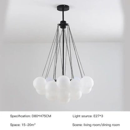 Modern black metal chandelier with frosted glass ball shades in a cloud-like cluster for dining room decorbites frosted glass
