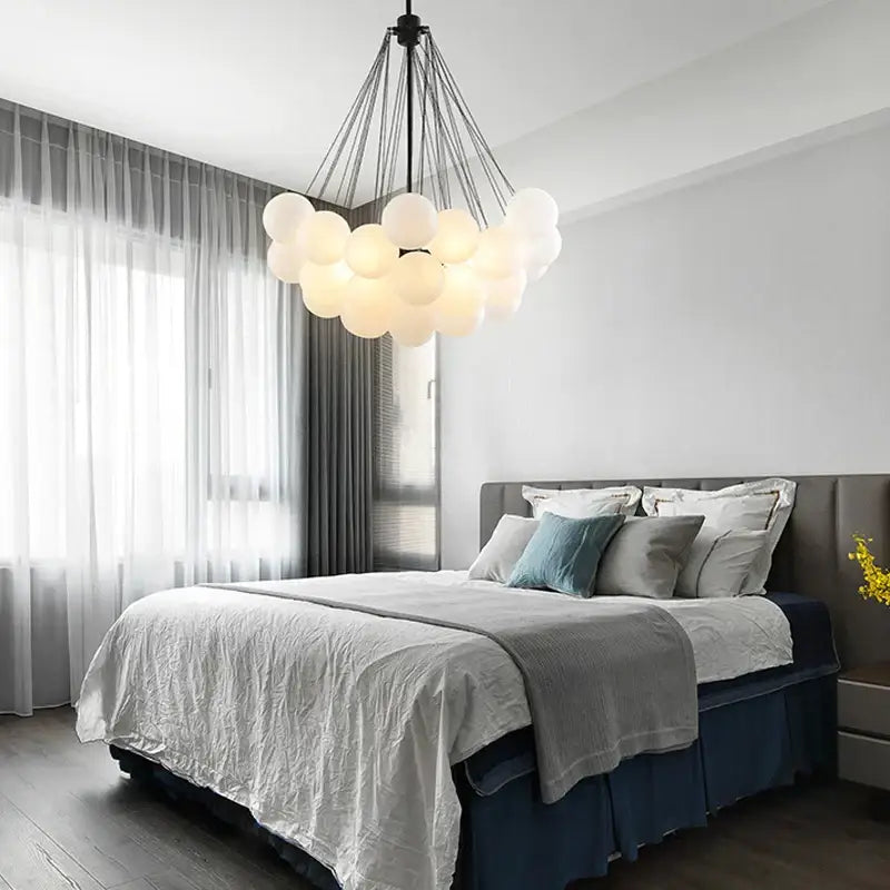 Modern gold and black frosted glass ball chandelier with cloud-shaped pendant light for dining room decorbites frosted glass