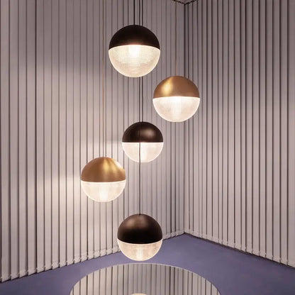 Modern gold and black glass ball led pendant light with matte black and brushed gold tops for bedroom decorbites decor