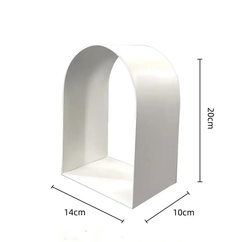 White arched shelf with smooth minimalist design complements modern gold and black decorbites golden arches metal sculpture