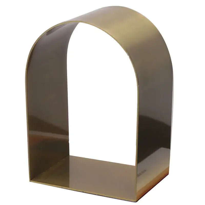 Modern gold and black golden arches metal sculpture bookend with a sleek brass finish for stylish living room decorbites golden arches