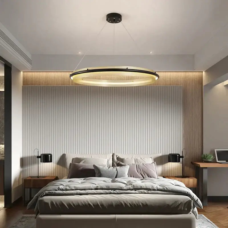 Modern gold and black honeycomb round pendant light with sleek black ring and warm inner glow for dining room decorbites pendant light