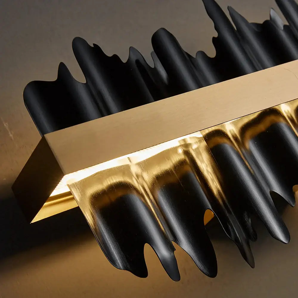 Black and gold modern wall sconce with sleek wave design for decorbites iceberg design led chandelier lighting