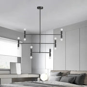 Modern black metal chandelier with spherical bulbs and rotatable arms in gold black finish ideal for led island light