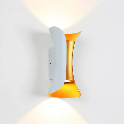 Modern gold and white dual-sided led wall light with curved metallic arms for warm ambient decorbites led wall lighting