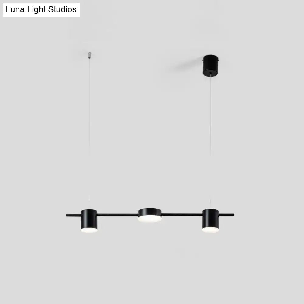 Decorbites modern linear metallic chandelier light with three black cylindrical pendant heads and warm white light
