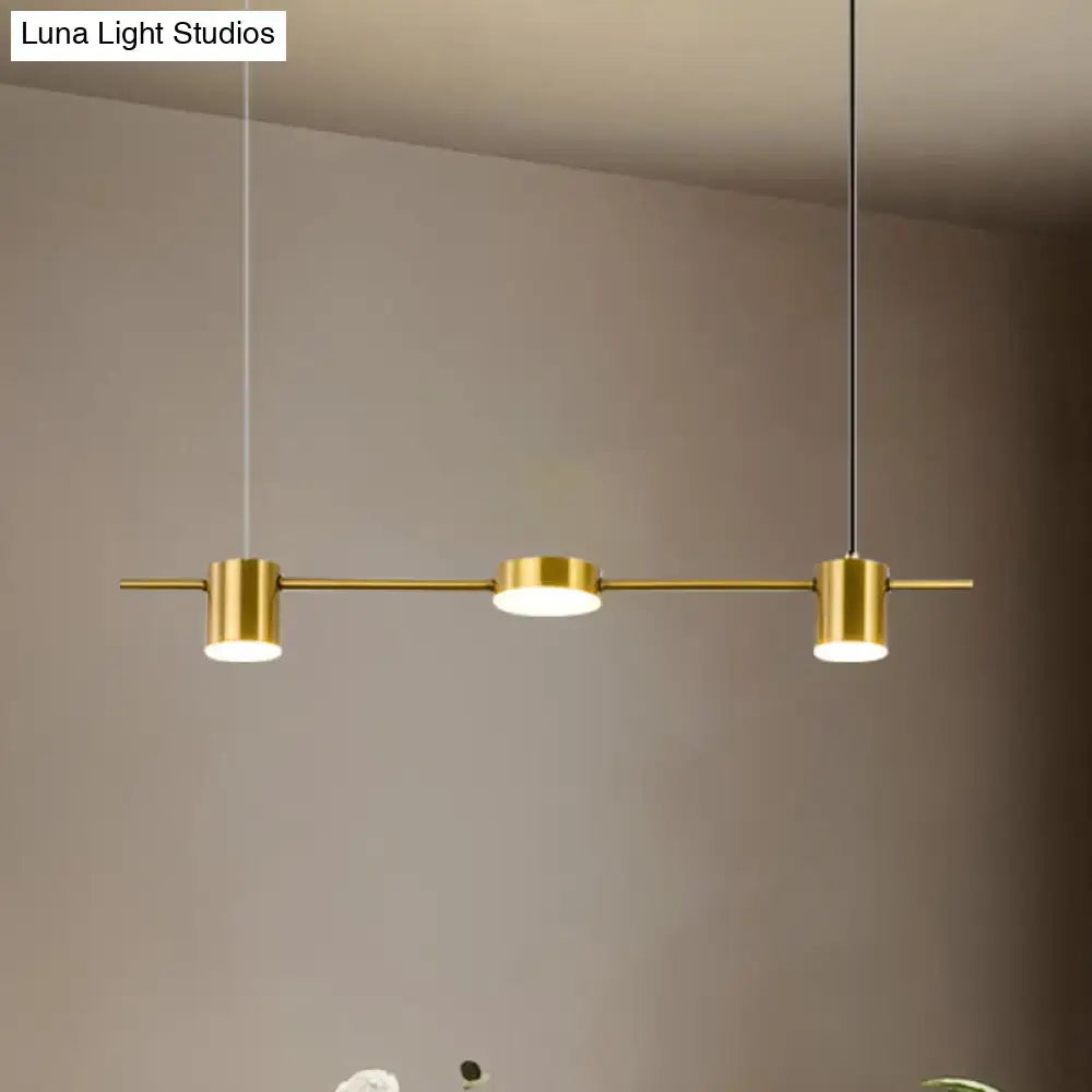 DecorBites™ modern linear black gold chandelier light with three warm white light cylindrical bulbs on a horizontal bar