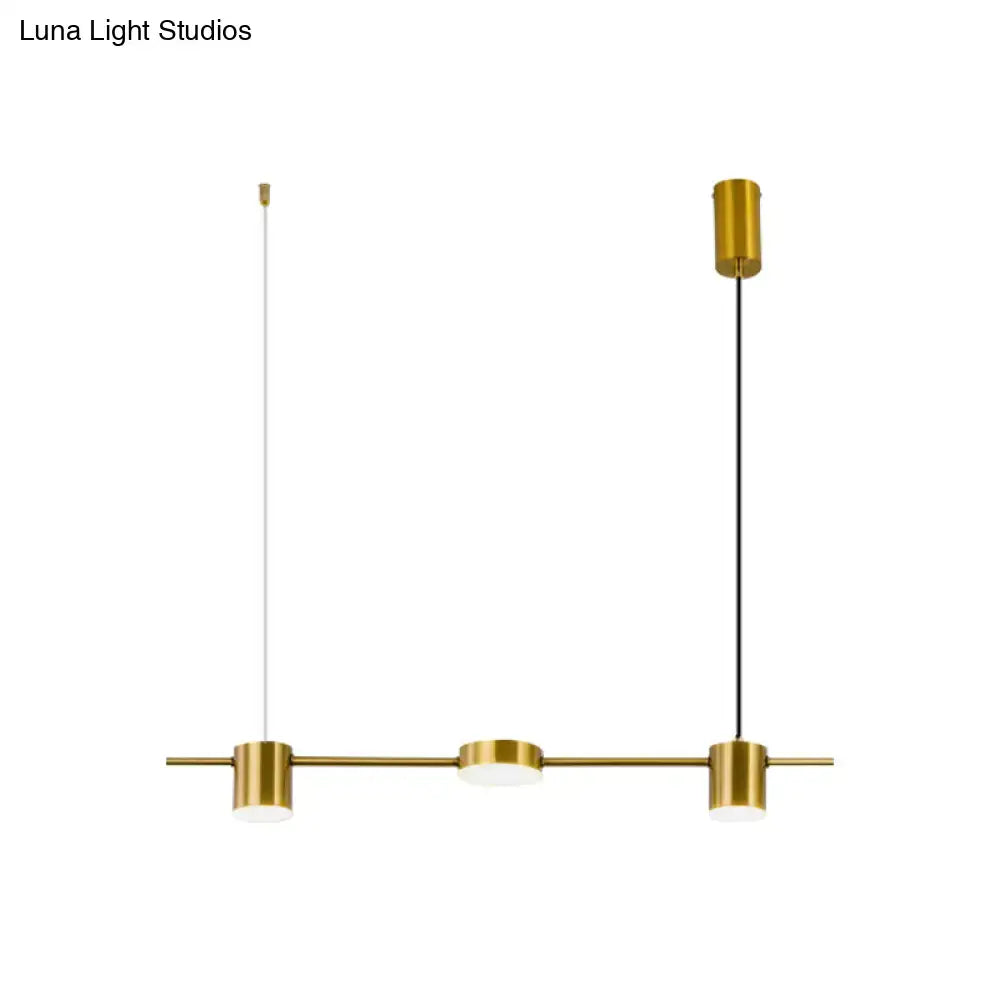 Decorbites modern linear metallic chandelier light with three gold-toned cylindrical fixtures and warm white light