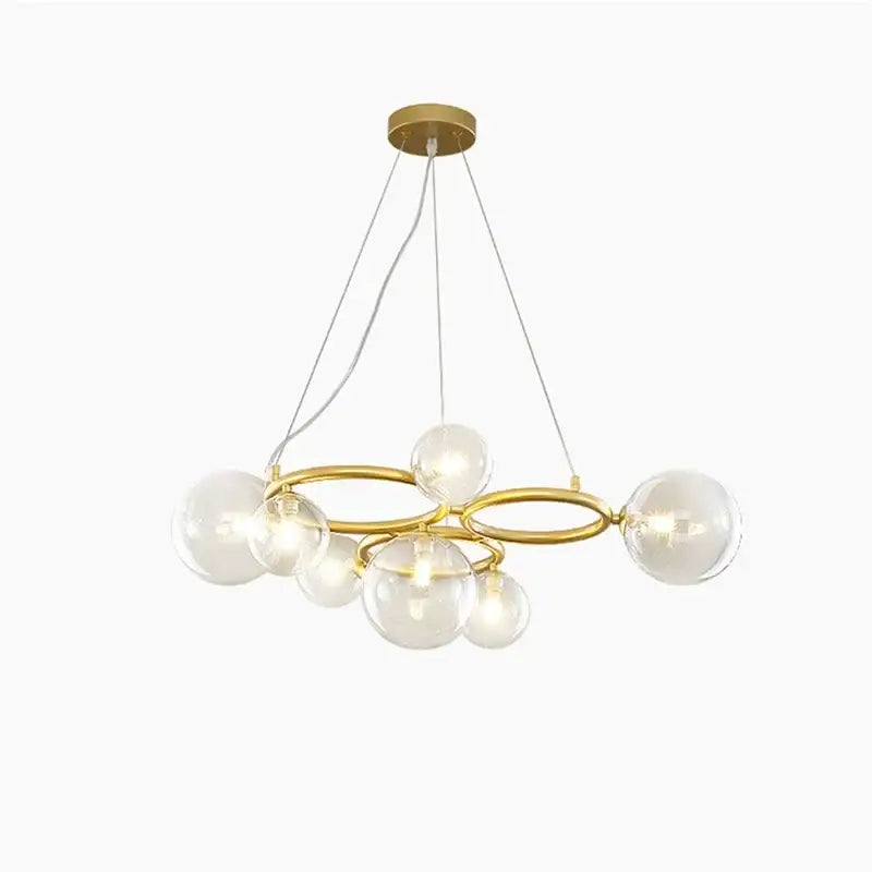 Modern gold black magic bean ceiling chandelier with gold-toned metal rings and clear glass globe bulbs for dining room light