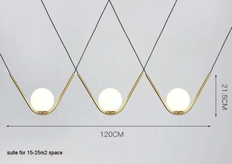 Modern gold and black pendant light with three frosted glass globes and black cords from decorbites golden black perle collection