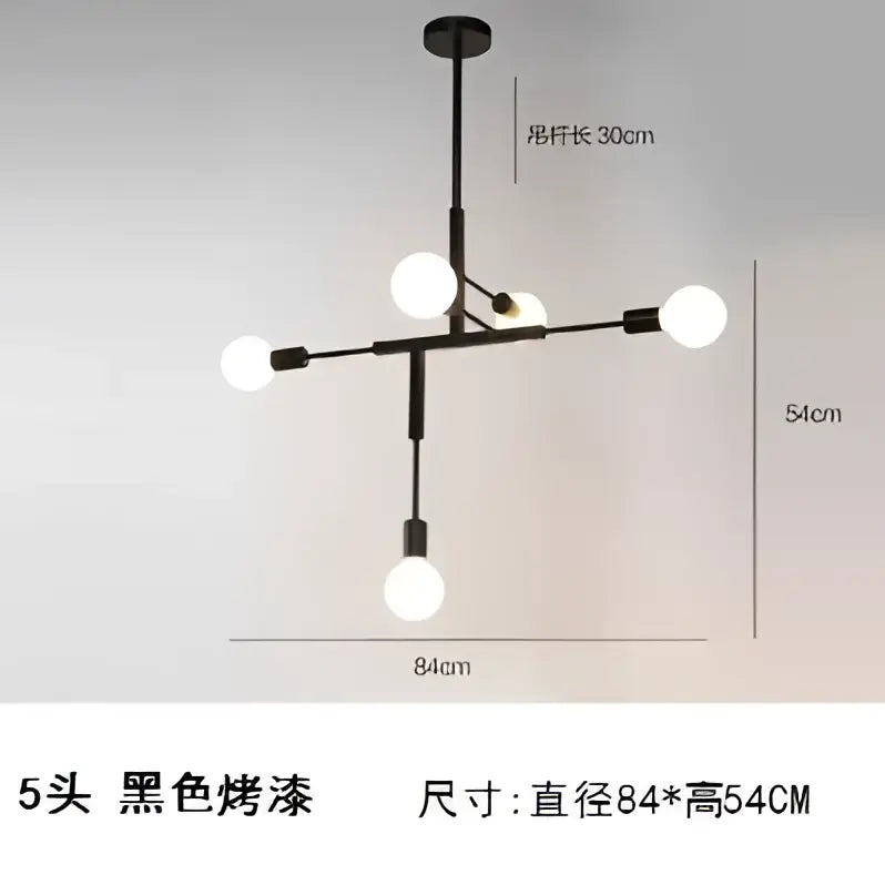 Modern gold and black pendant light with black finish and five white bulbs in decorbites cross style design