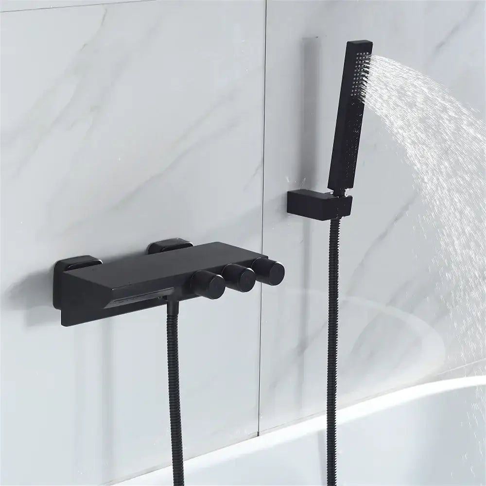 Modern gold and black shower set with black matte finish rectangular control unit and handheld spray head for gold black tub decorbites