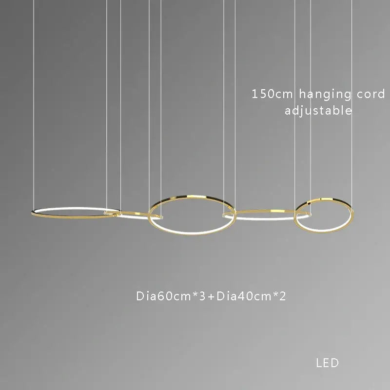 Modern gold stainless steel pendant lights with three interconnected circular rings for dining room decorbites gold stainless
