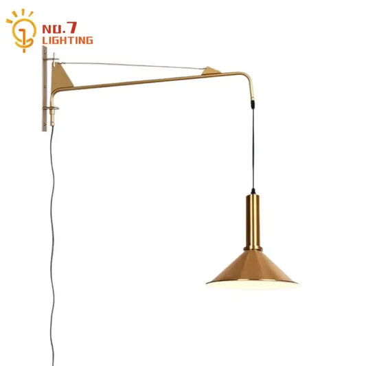 Modern gold and black swing arm wall lamp with brass finish and conical shade for decorbites gold black bedroom decor