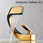 Modern gold and black basin faucet with sleek curved waterfall design for stylish bathroom fixtures