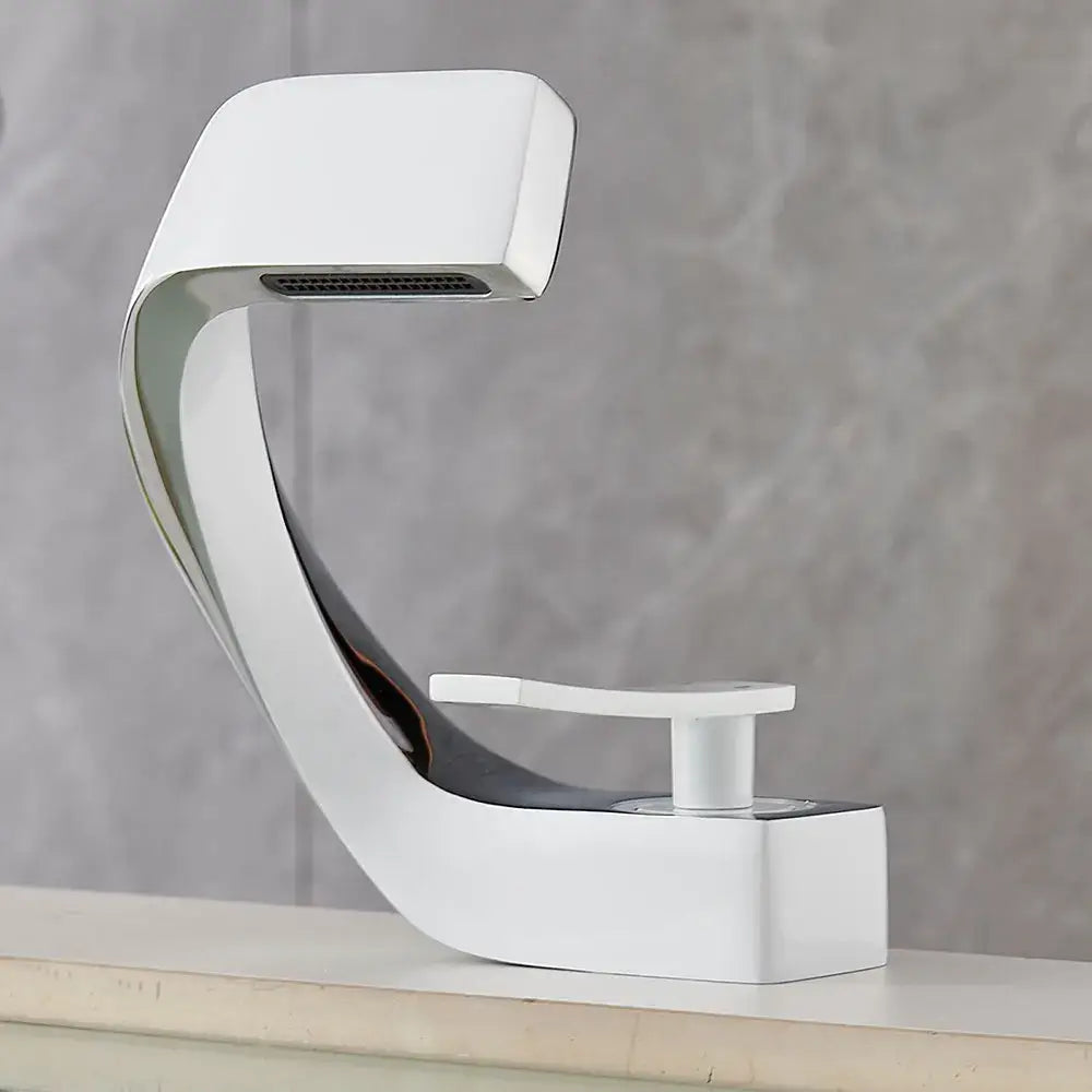 Modern white and chrome basin faucet with sleek curved design for contemporary bathroom fixture use