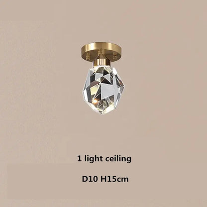 A dimmable crystal chandelier with clear faceted crystal and gold-toned ceiling mount for modern dining room decorbites copper led