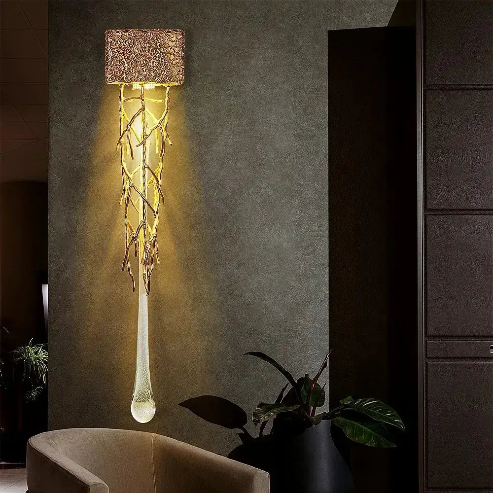 A modern gold branch art cage crystal chandelier with woven textured top and teardrop glass pendant for dining room decorbites branch art