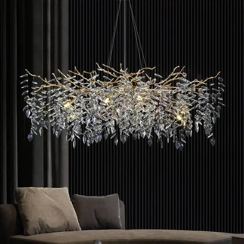 Modern gold branch crystal chandelier with cascading clear crystal leaves emits warm glow for dining room decorbites branch crystal