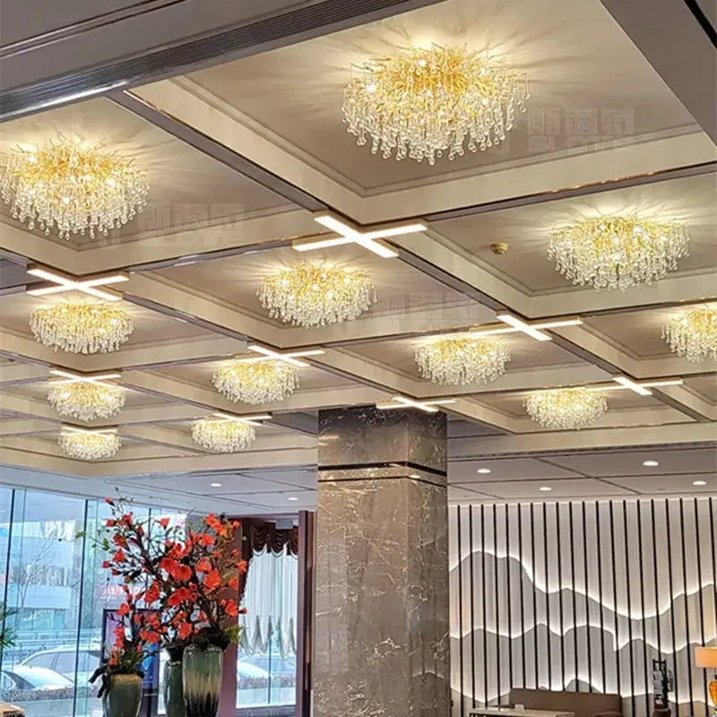 Modern gold branch crystal led wall light featuring golden crystal chandeliers with cascading glass droplets decorbites crystal led