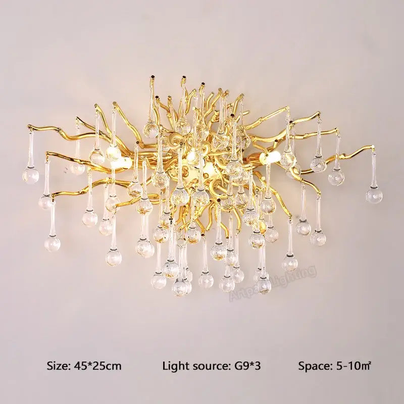 Modern gold branch crystal led wall light featuring intricate arms and clear teardrop crystals for living room decorbites crystal led