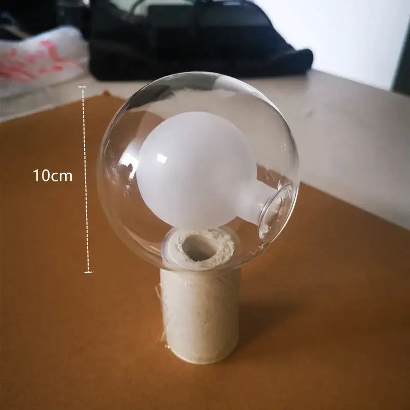 Modern gold branch glass bubble resin pendant light with clear glass globe and frosted bulb on ceramic base for dining room