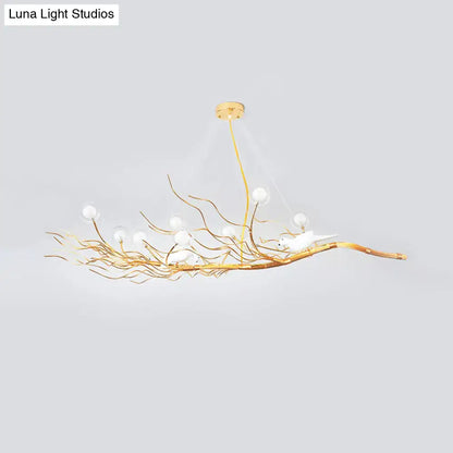 Golden branch-style chandelier with white birds and spherical lights modern gold branch pendant light for dining room