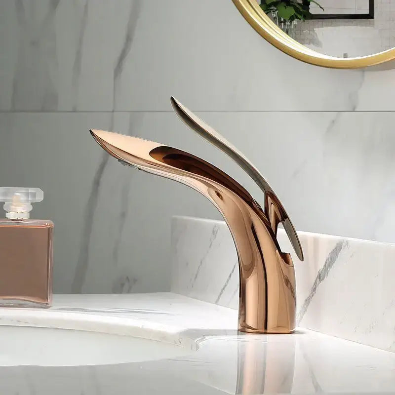 Rose gold decorbites brass basin faucet with sleek modern design and two curved spouts for bathroom sink mixer