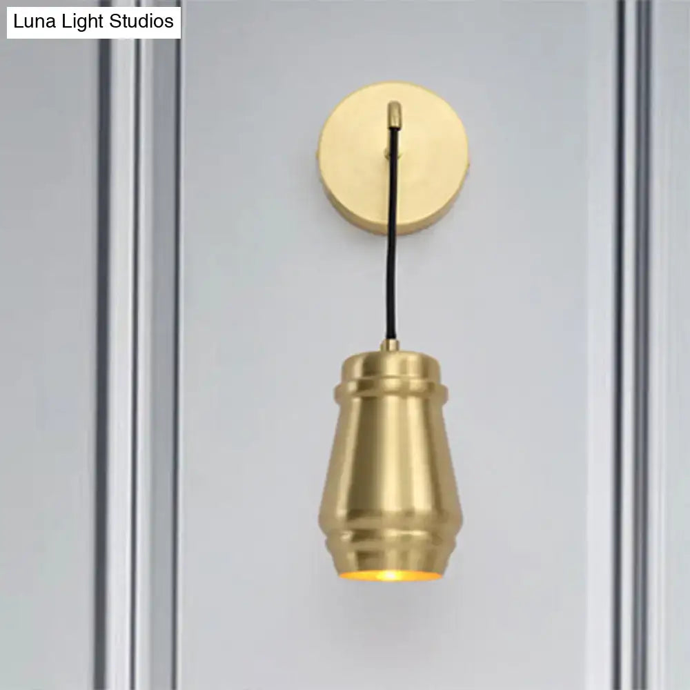 Modern gold brass bedroom wall sconce with metal shade and brass finish inch fixture with tapered cylindrical shade