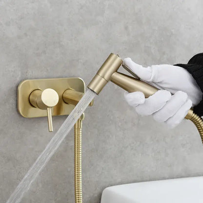 Modern gold brass bidet sprayer with sleek design and flexible hose for bathroom hot and cold faucet by decorbites brass bidet