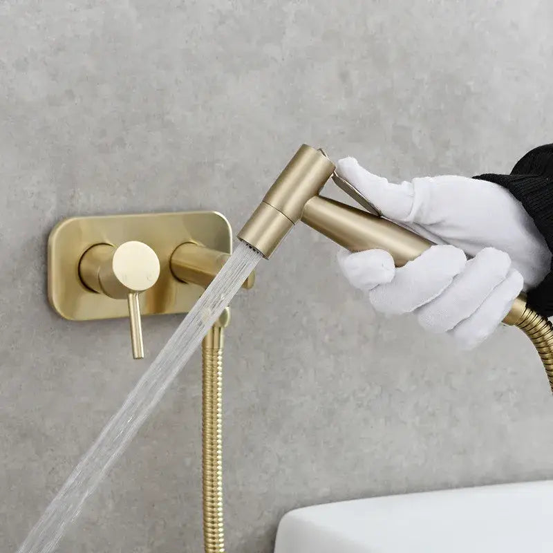 Modern gold brass bidet sprayer with sleek design and flexible hose for bathroom hot and cold faucet by decorbites brass bidet