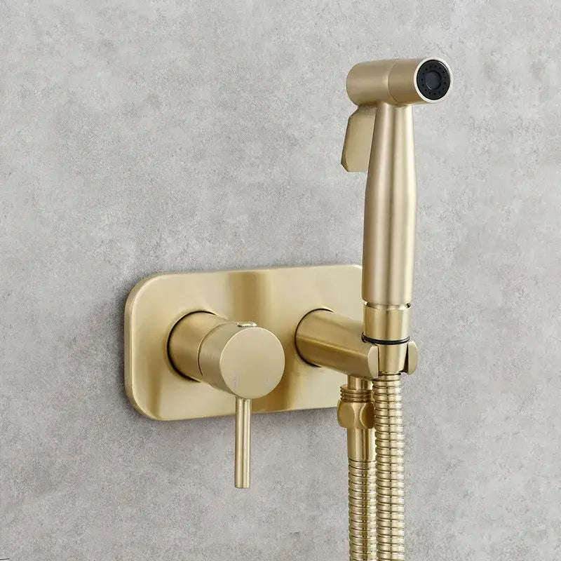 Modern gold brass bidet sprayer with flexible hose and sleek design for bathroom use by decorbites brass bidet