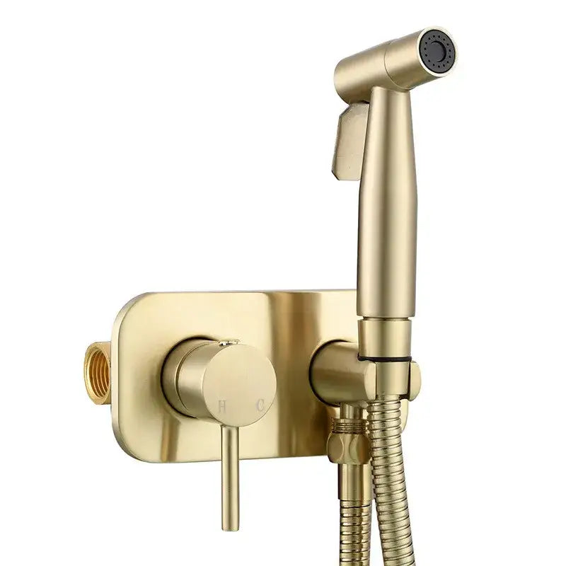 Modern gold brass bidet sprayer set with flexible hose featuring a sleek decorbites brass bidet sprayer design