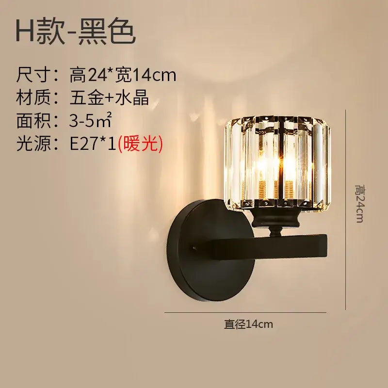 Black wall sconce with cylindrical crystal glass shade and metallic base for modern gold brass crystal wall decorbites bedroom light