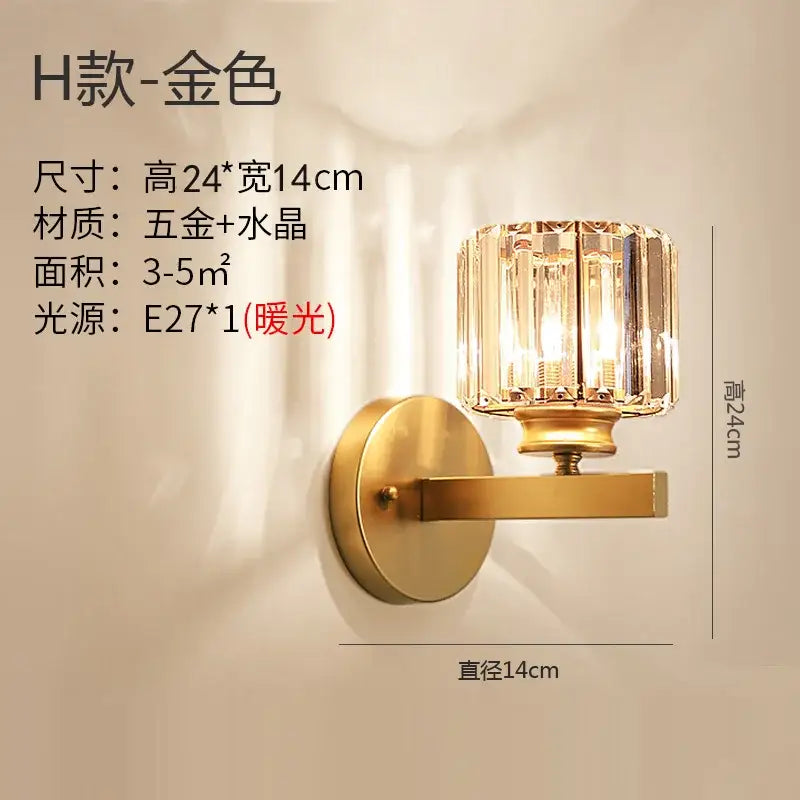 Modern gold brass crystal wall sconce with faceted crystal shade and brushed metal base for bedroom decorbites crystal modern lighting